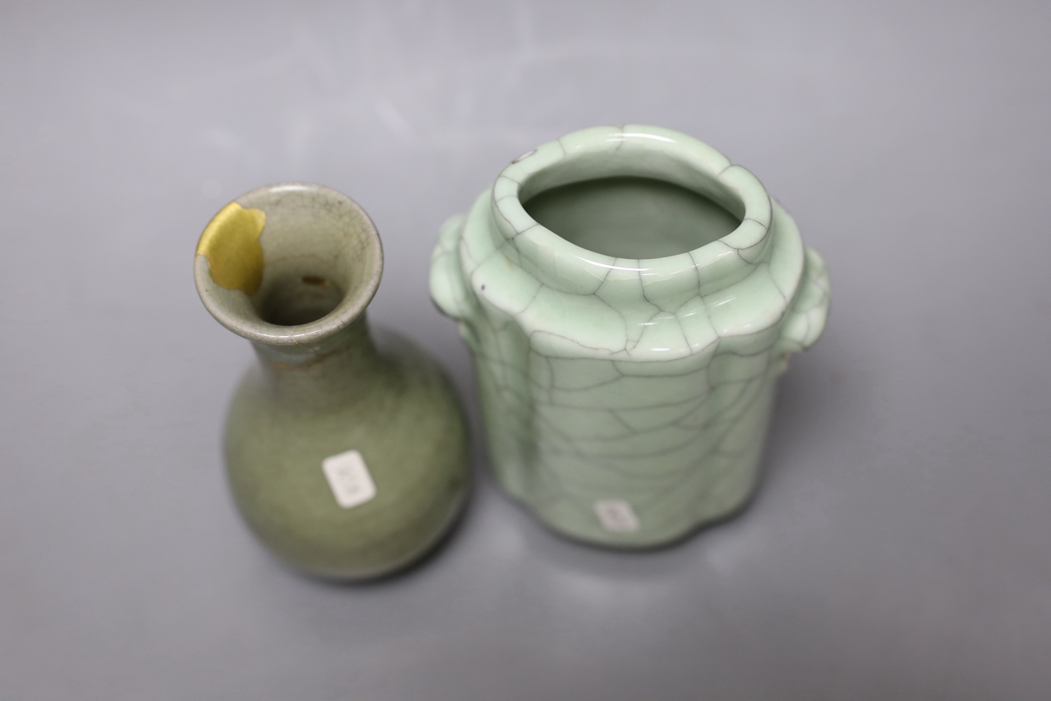 A Chinese celadon bottle vase, and a celadon crackle glaze vase, Yuan-Ming or later, 14cm